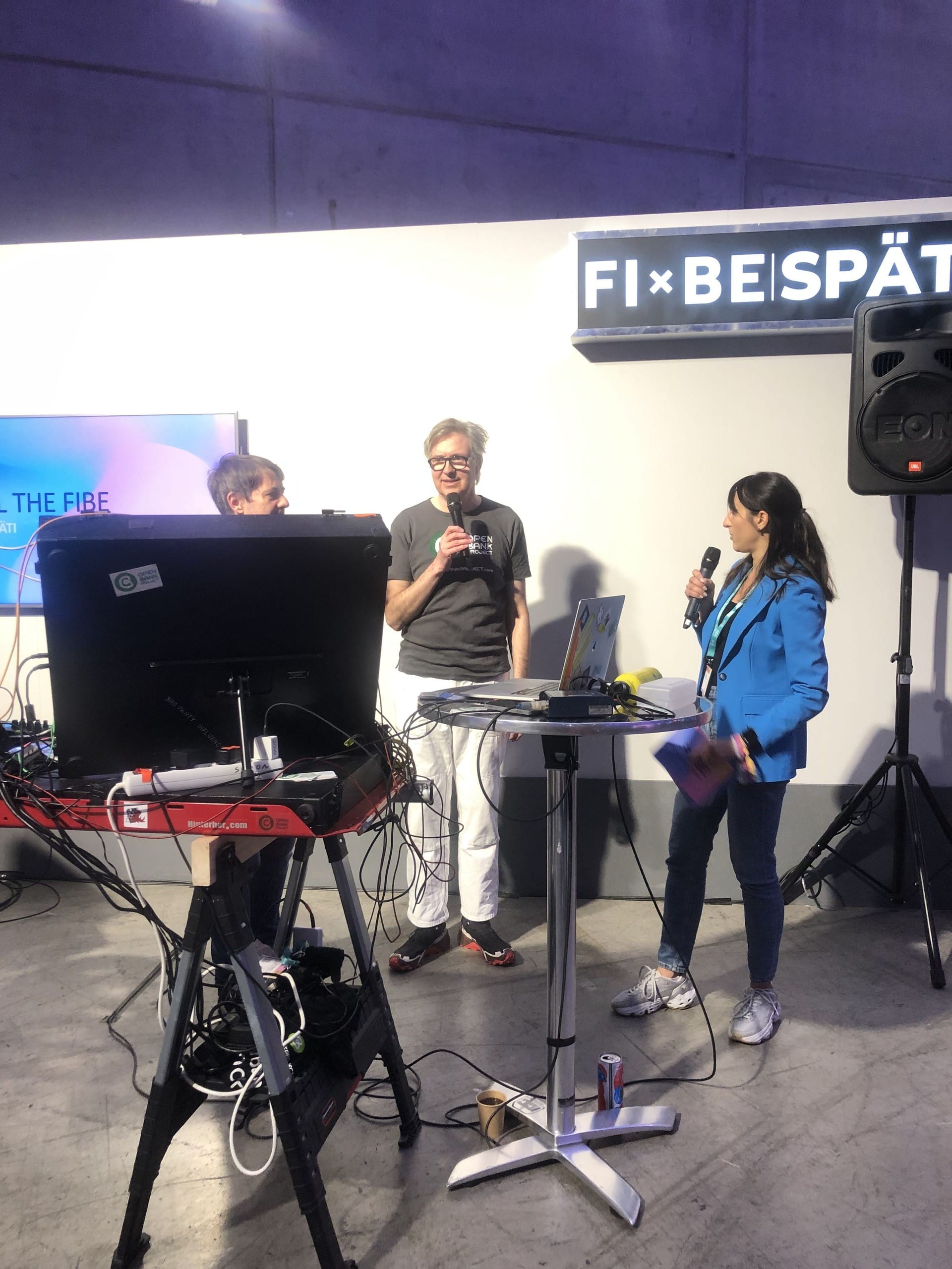 Daniel and Simon explaining their setup prior to performing at the FIBE conference, 2024.