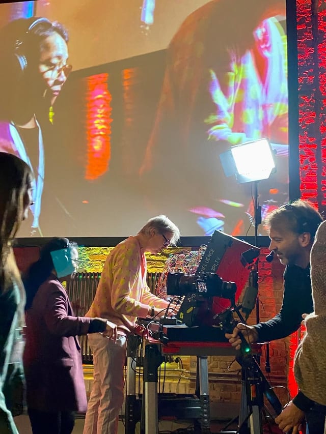 Simon performing at the Anticipatory Action Global Dialogue Platform, 2024